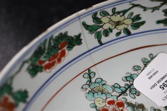 A Chinese famille verte dish, Kangxi period, D. 36cm, cracked